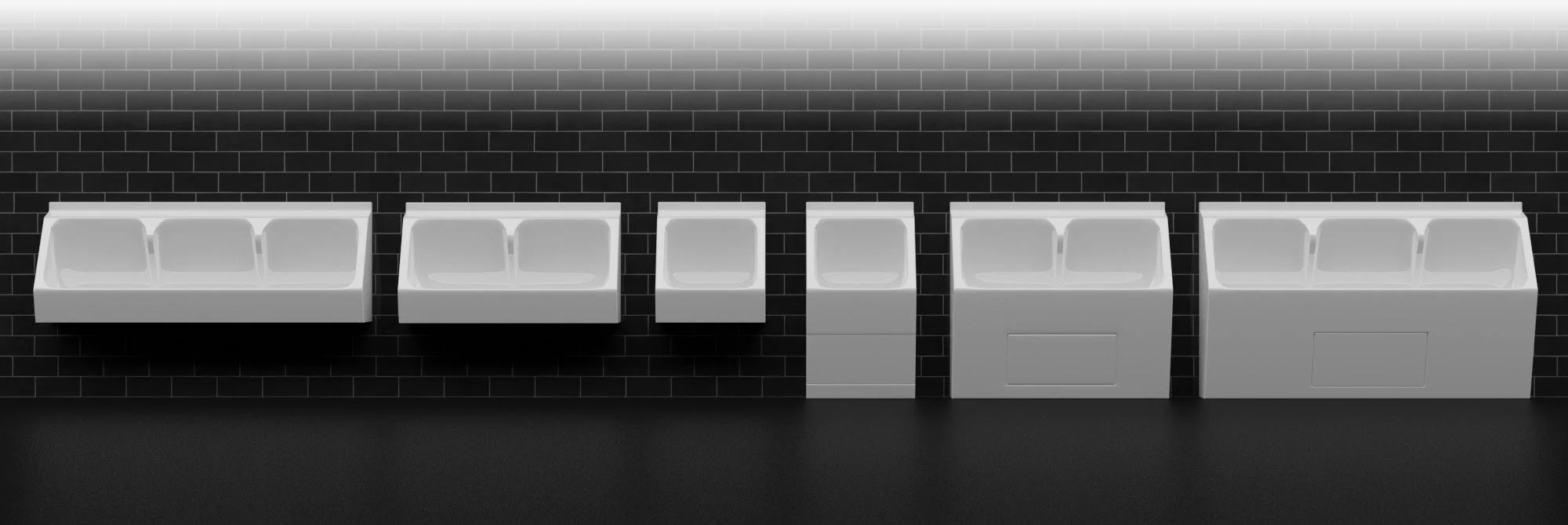 A selection of GRP urinal troughs in varying sizes fixed to dark coloured tiled wall in a washroom